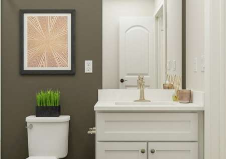 Rendering of a full bath focused on the
  white cabinet vanity. Beside it is the toilet and the shower.
