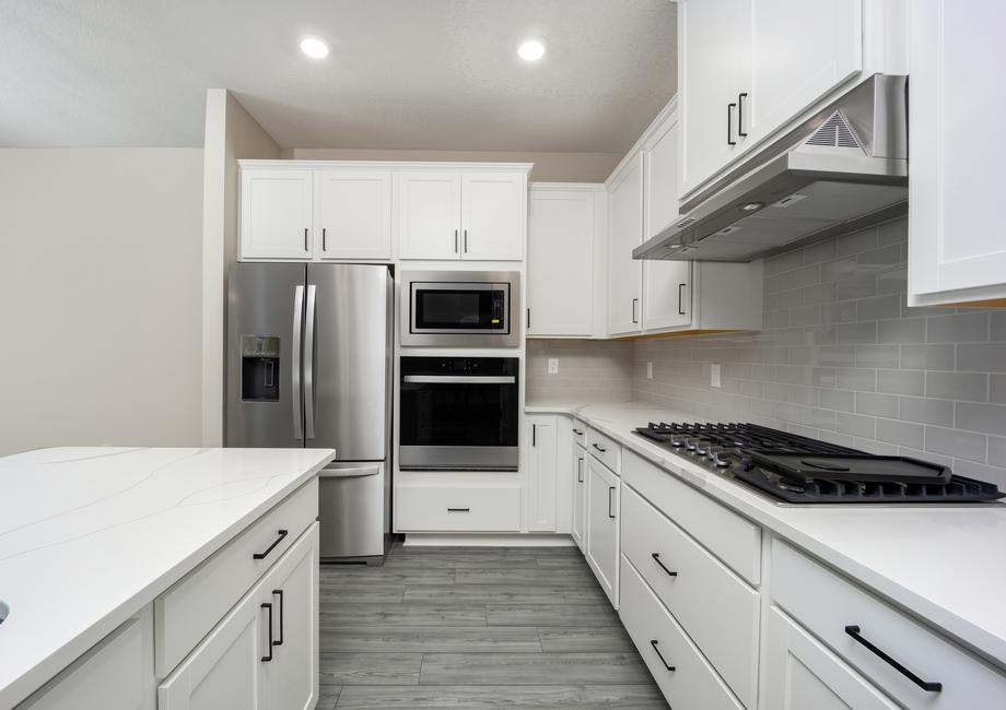 The spacious kitchen is perfect for preparing your family's favorite meals and treats.