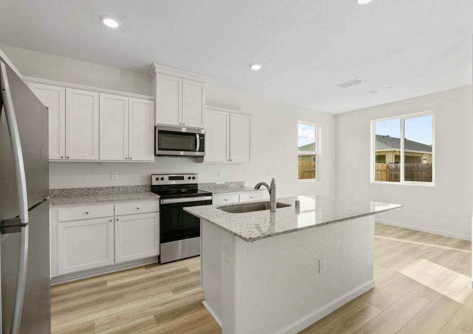 The kitchen lets in an abundnance of natural light.