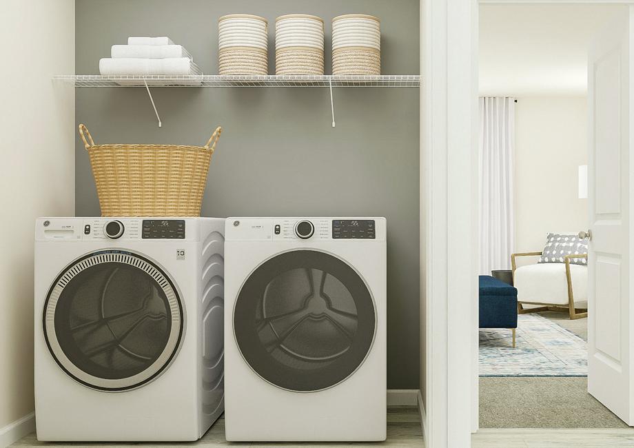 Rendering of the laundry room with a
  washer, dryer and shelf. The living room is visible through an open doorway.