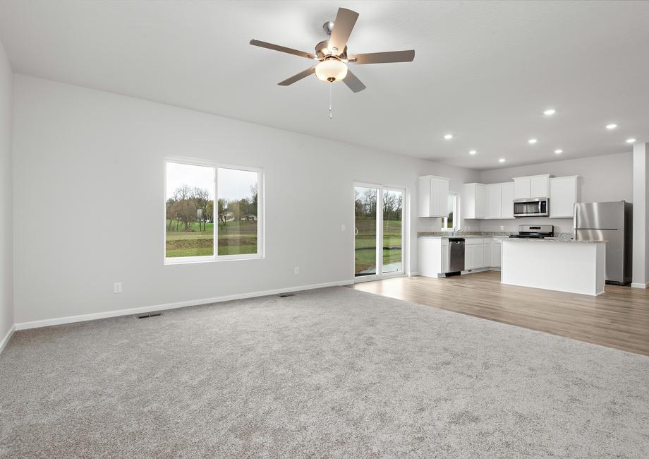 The family room is spacious and open to the kitchen.