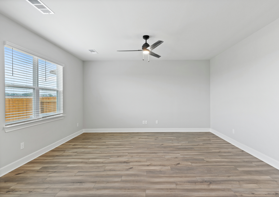 The large family room has plenty of space for furniture.