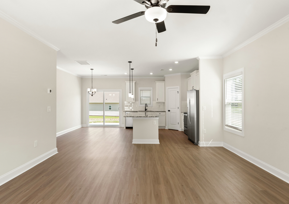 The kitchen opens to the family room and dining room.