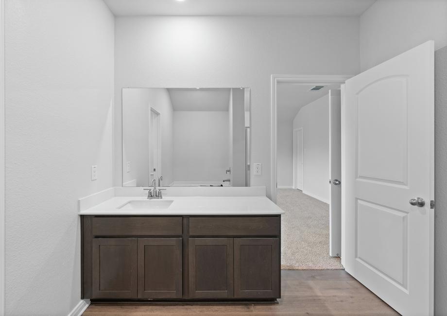 The master bathroom of the Juniper plan has a large vanity space.