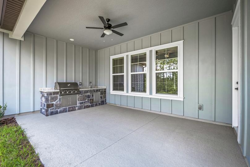 Cooking out is a breeze with a covered outdoor kitchen.