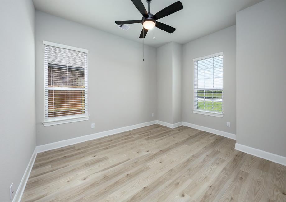 The flex room is located off the entry and is the ideal space for a home office.