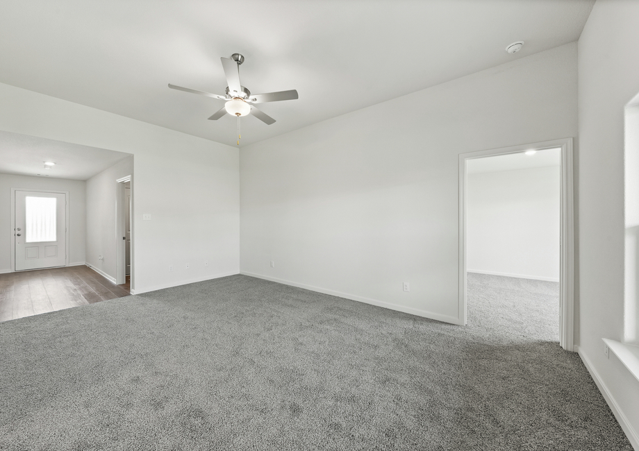 The spacious family room has plenty of room for furniture.