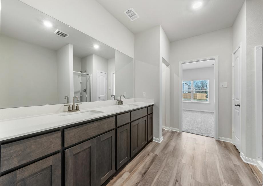 The master bathroom of the Cypress has a large vanity with lots of counterspace and two sinks.