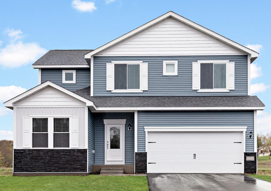The Henry is a beautiful two story home with siding.