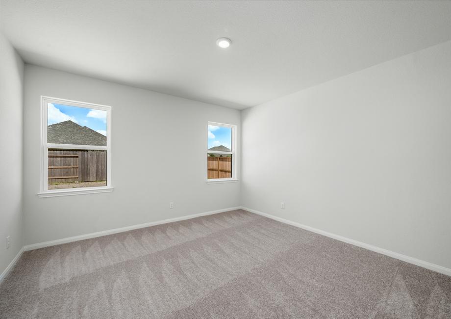 The master bedroom has plenty of natural lighting