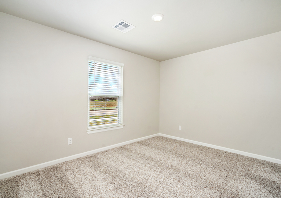 Secondary bedrooms are the perfect space for guests to relax.