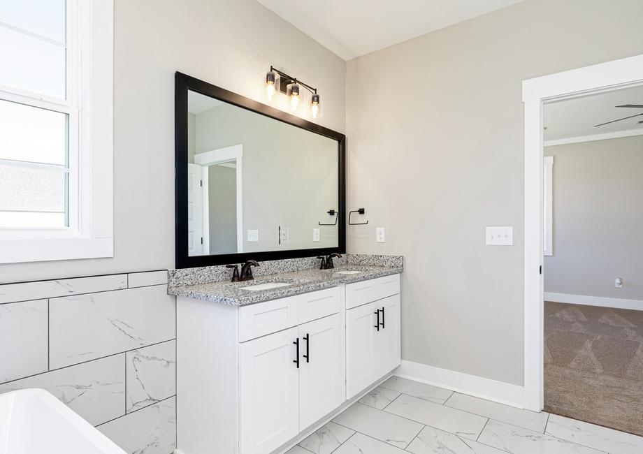 Master bathroom with a large vanity.