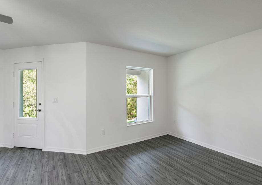 The dining room is right off the kitchen and boasts a large window