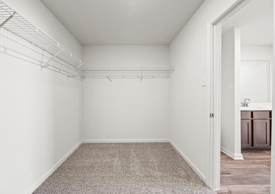 The walk-in closet in the master suite has plenty of storage space.