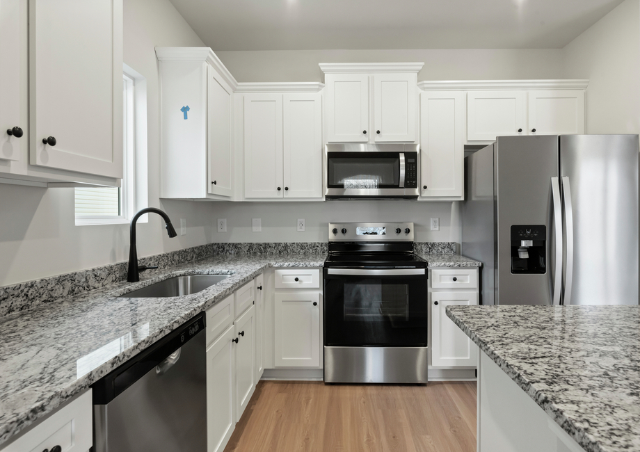 The kitchen has granite countertops