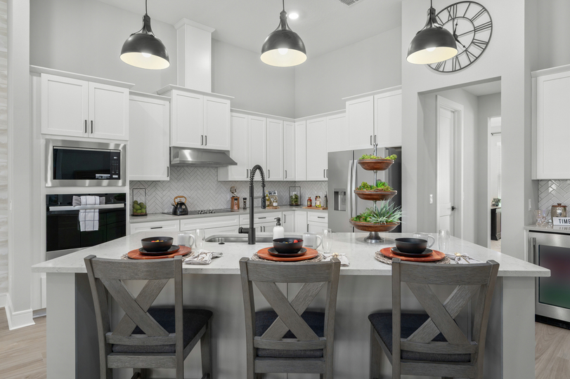 Stainless steel appliances are included.