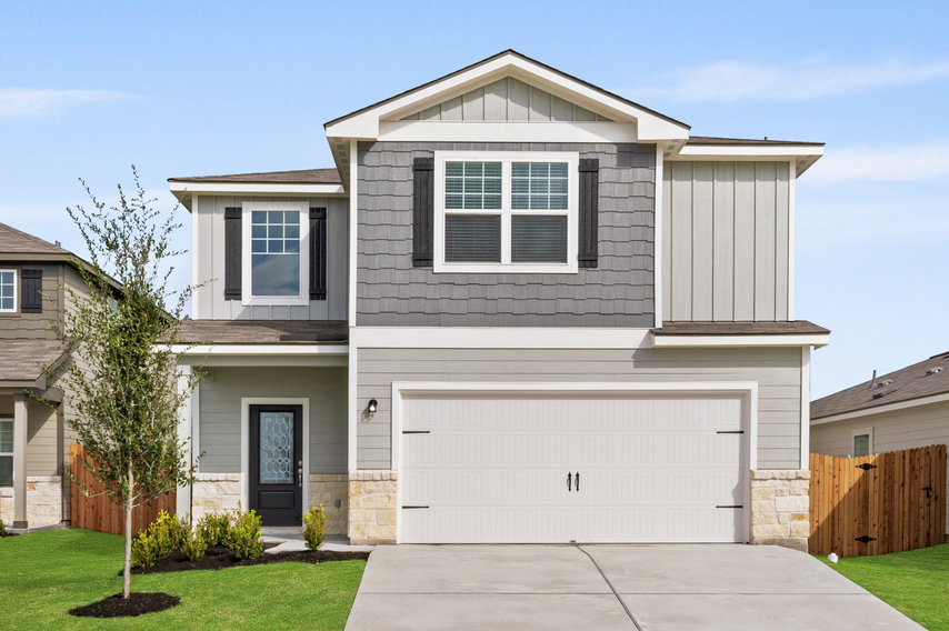 Exterior of the Torres plan with front yard landscaping