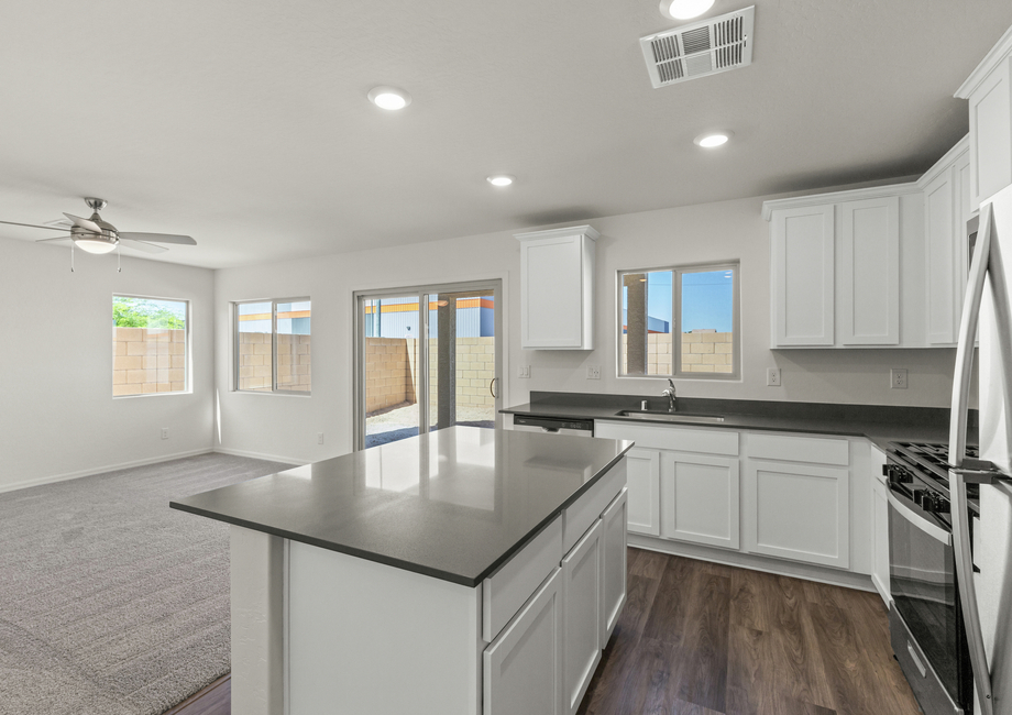 The kitchen sits adjacent to the family room in the Cypress.