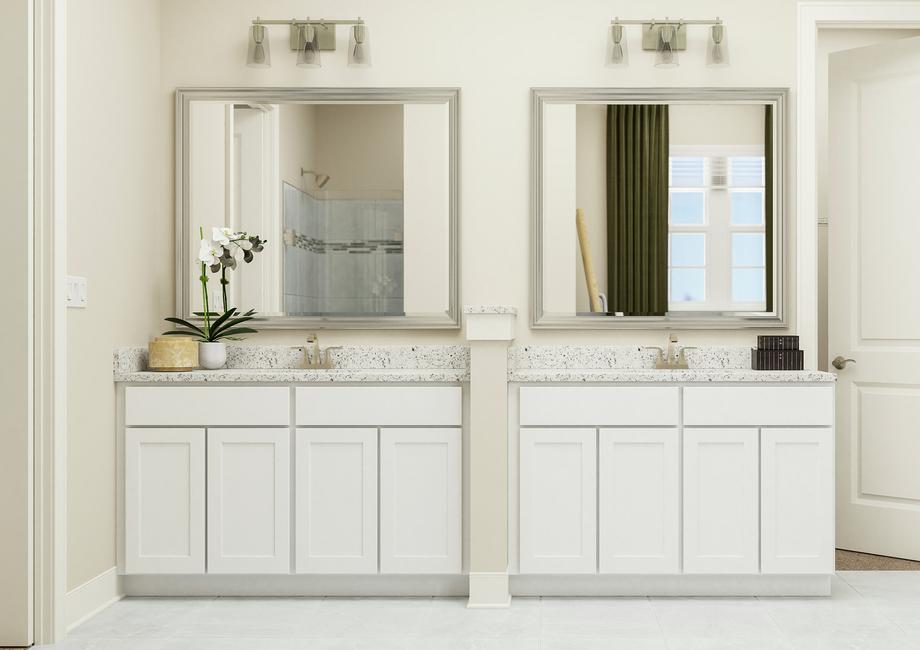 Rendering of spacious master bath showing
  a double sink vanity with white cabinetry and light fixtures and tile
  flooring throughout.