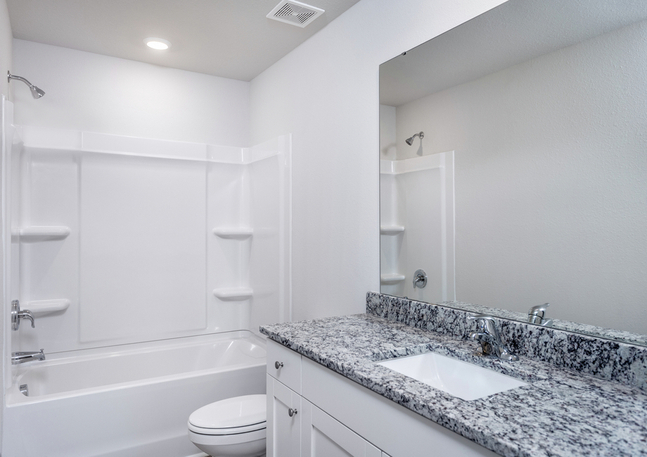 The bathrooms have granite countertops