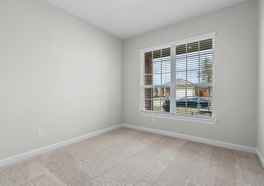 This additional room is perfect for a home office or exercise room.