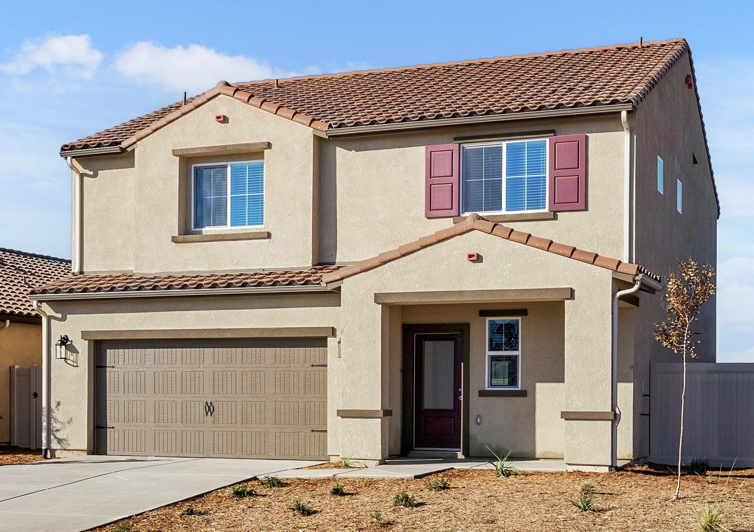 The Redondo is a beautiful two story home with stucco.