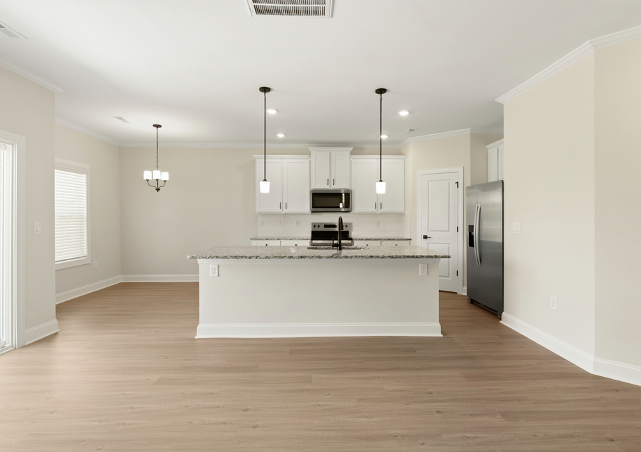 The kitchen overlooks the living area