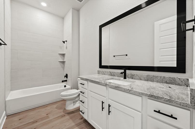 Large framed mirrors are included in all bathrooms.