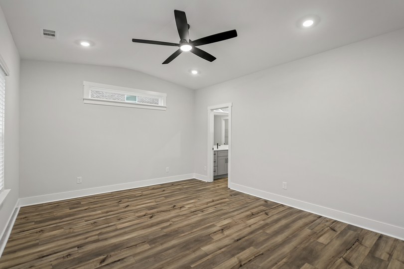 The master bedroom is beautiful and relaxing.