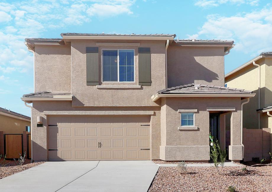 This home has a beautiful stucco exterior with a 2-car garage.