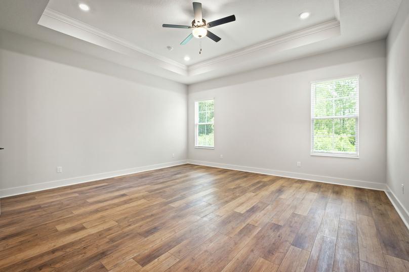 Retreat to the master bedroom at the end of the day.