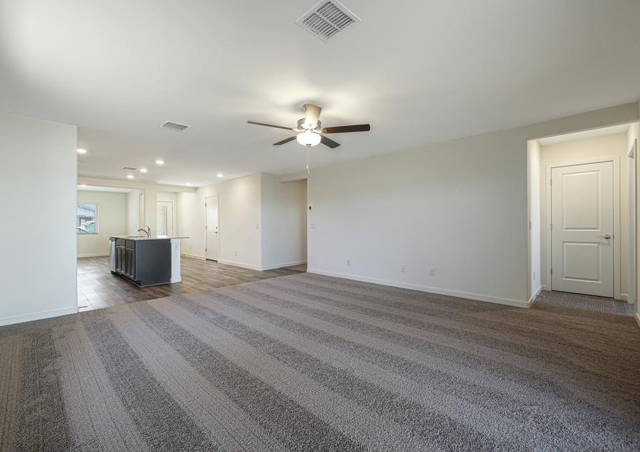 The family room offers great natural light and soaring ceilings.