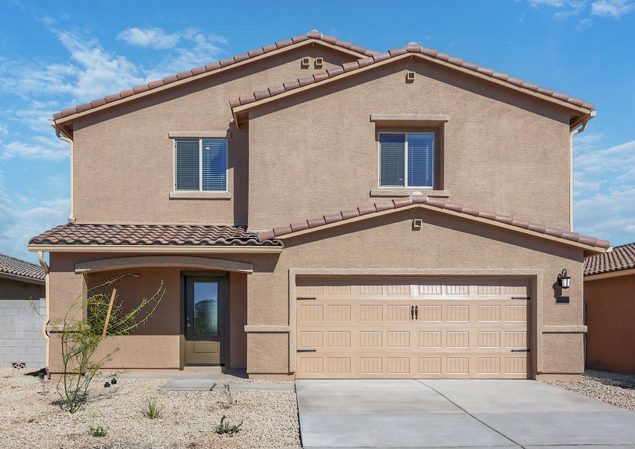 This home has a 2-car garage and a beautiful stucco exterior.