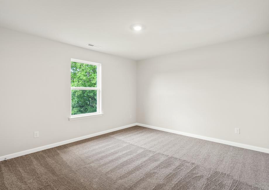 The secondary bedroom makes the perfect space for a children's playroom