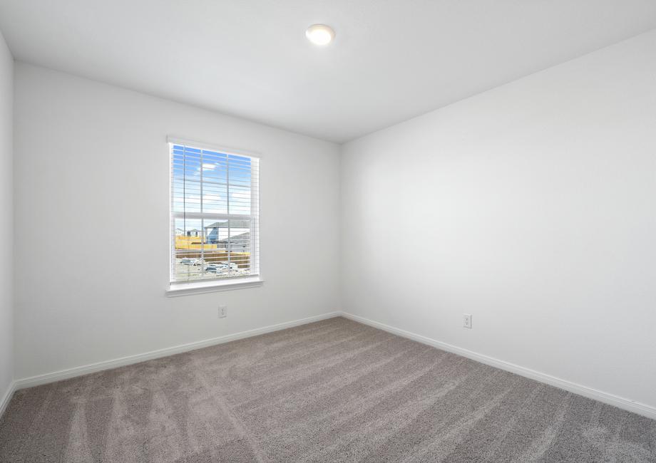 One of the spacious bedrooms.