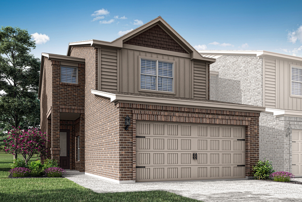 The Marsh floor plan is a beautiful, two-story, brick townhome with siding detail.