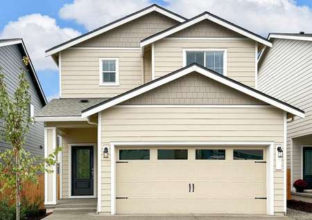 The Adams is a beautiful two story home with siding.