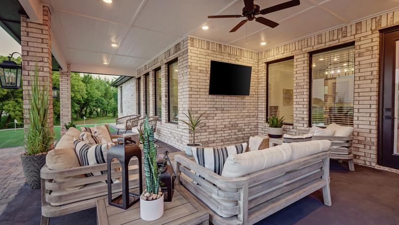 Spacious covered back patio perfect for relaxing.