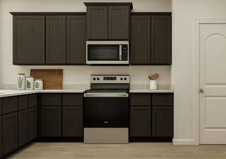 Rendering of the kitchen featuring wood
  cabinetry, stainless steel appliances and closed door pantry.