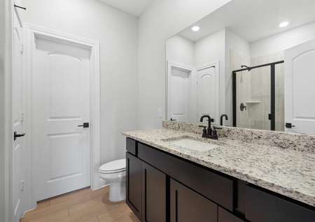 The master bathroom of the Piper has a large vanity.