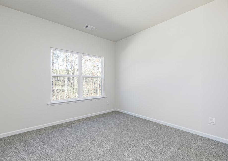 Unwind after a long day in this incredible master bedroom