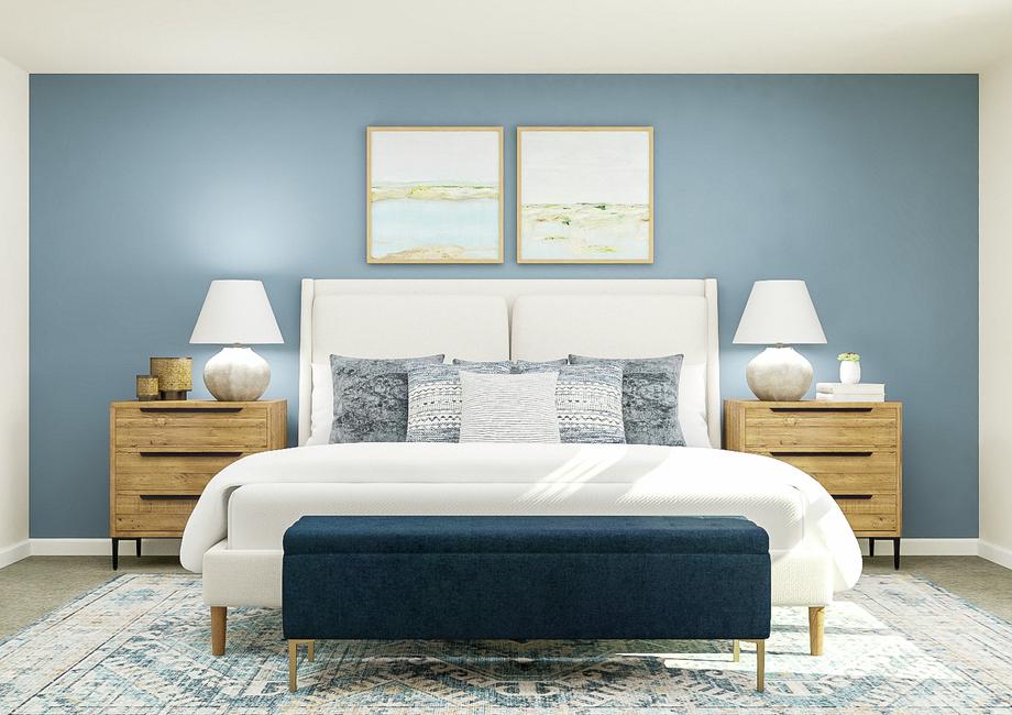 Rendering of the master bedroom in the
  Hennepin, which has a large bed centered between two nightstands. A bench
  sits at the foot of the bed and abstract artwork hangs above it.