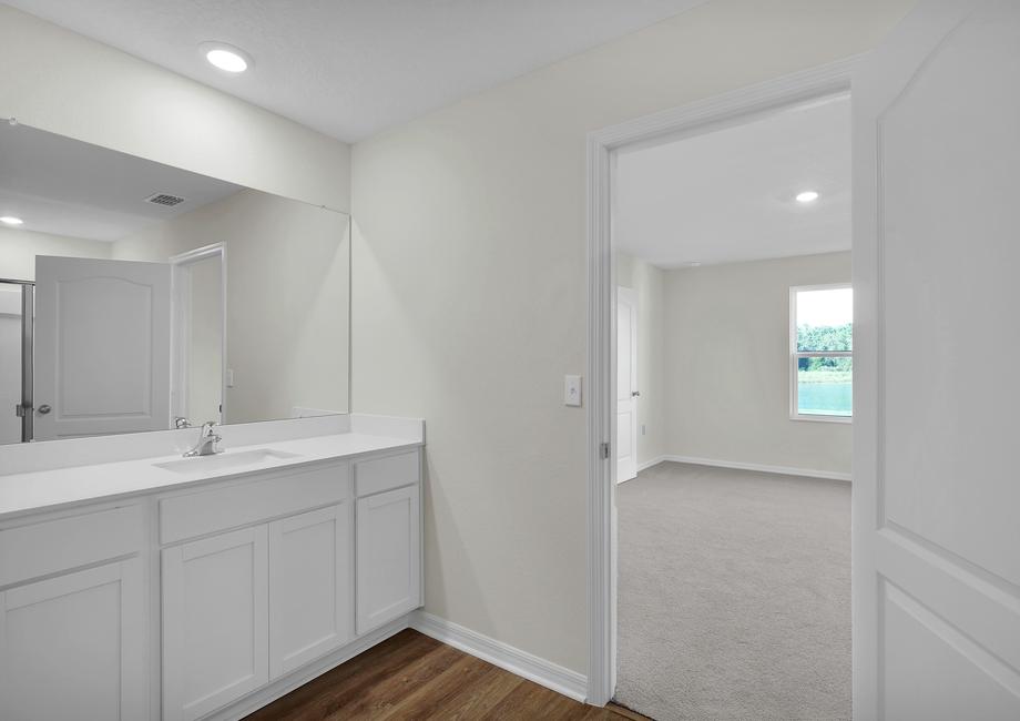 The master bathroom offers plenty of space to get ready in the mornings