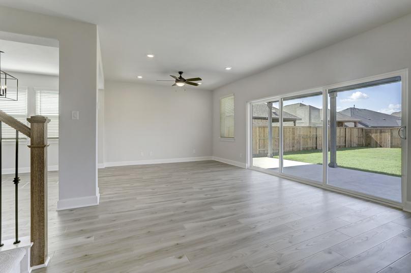 Open layout with the living room overlooking the back patio.