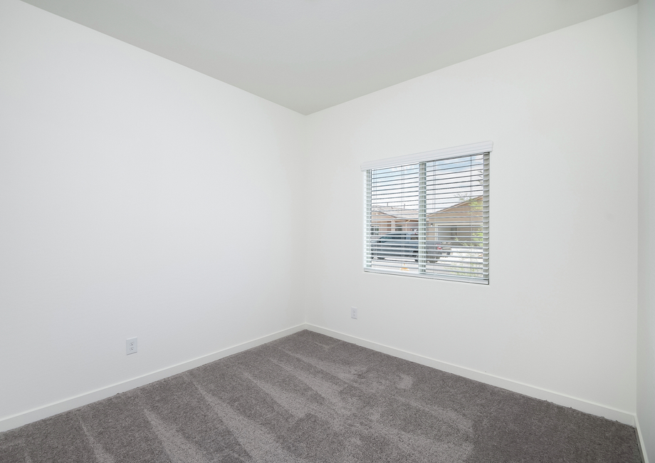 Spacious secondary bedrooms are the perfect space for family or guests to relax.