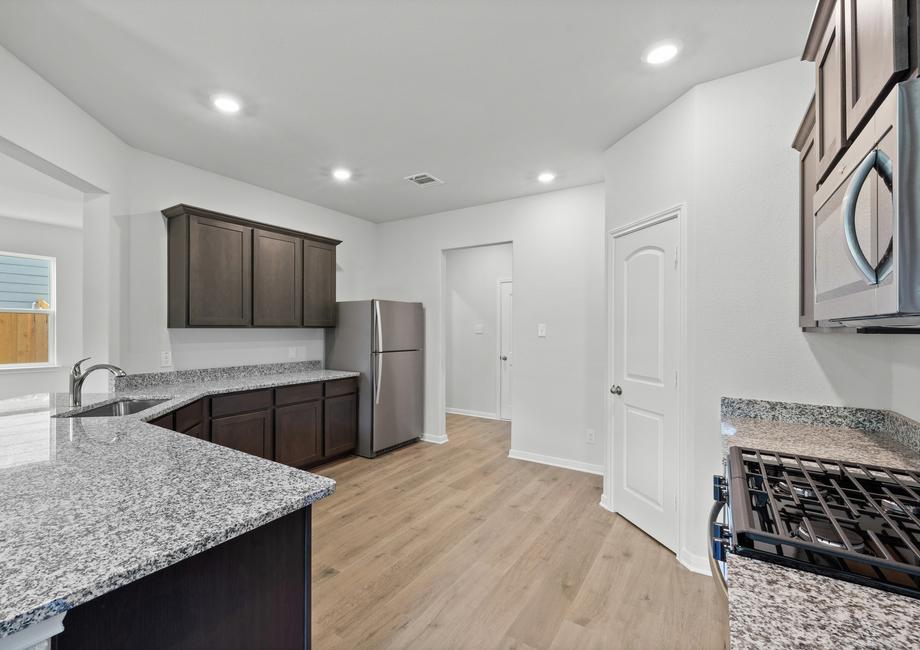 The kitchen of the Juniper has energy-efficient appliances.