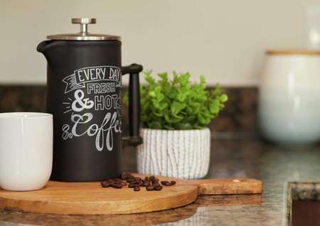 Trace coffee pitcher, cutting board, and coffee beans