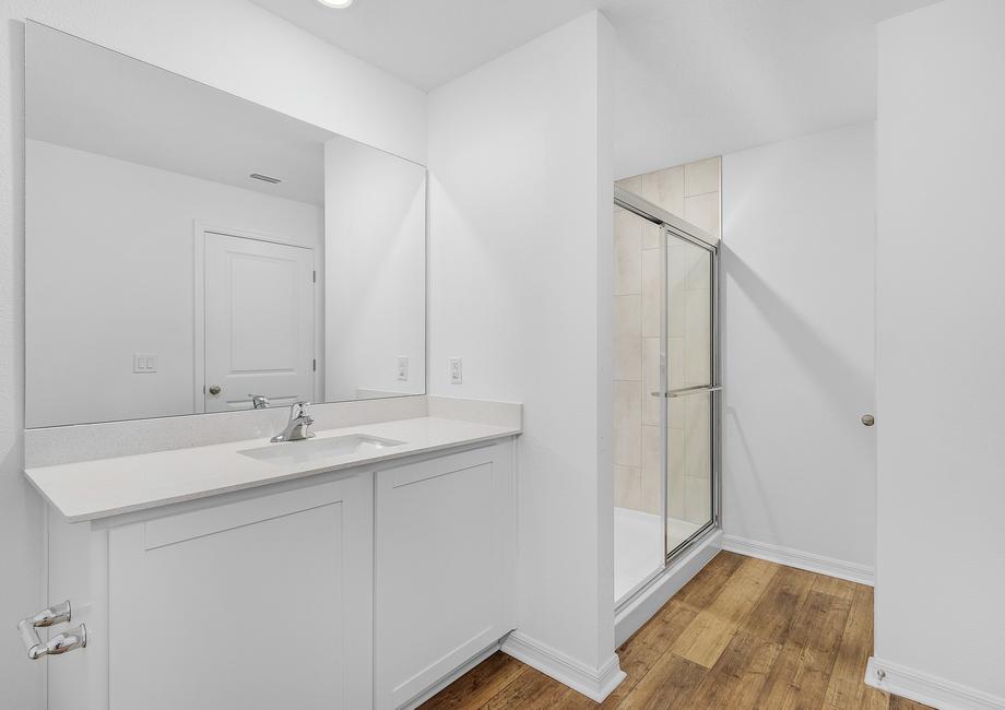 The master bathroom provides plenty of space to get ready in the mornings