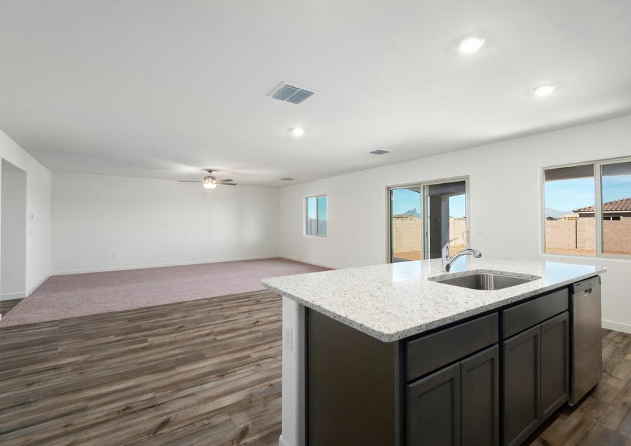 The kitchen opens up to the back patio.