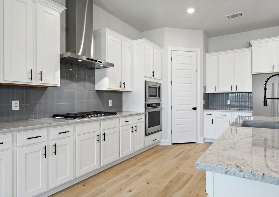 Stainless steel appliances come with the chef-ready kitchen.